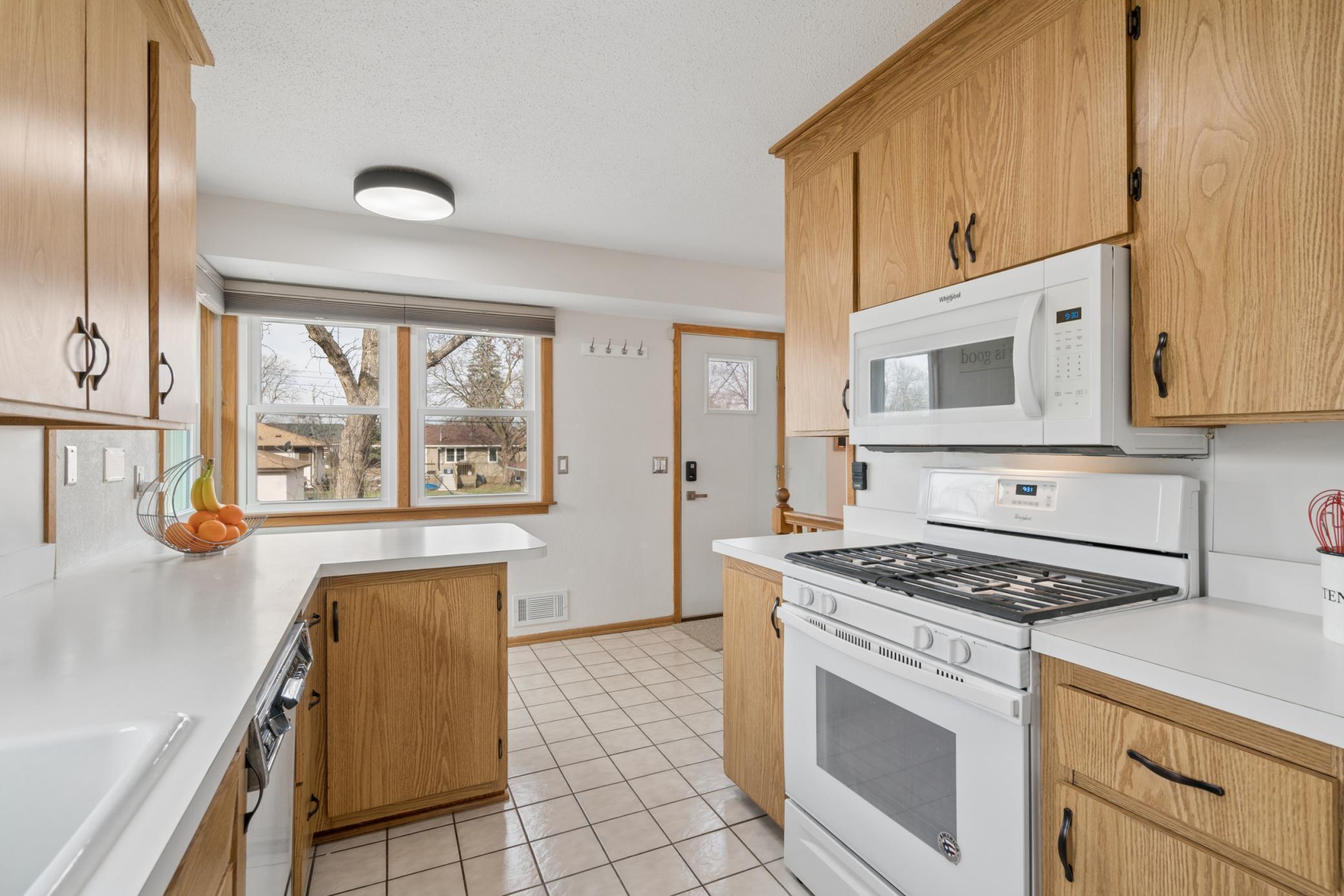 Gas range and tile floor!