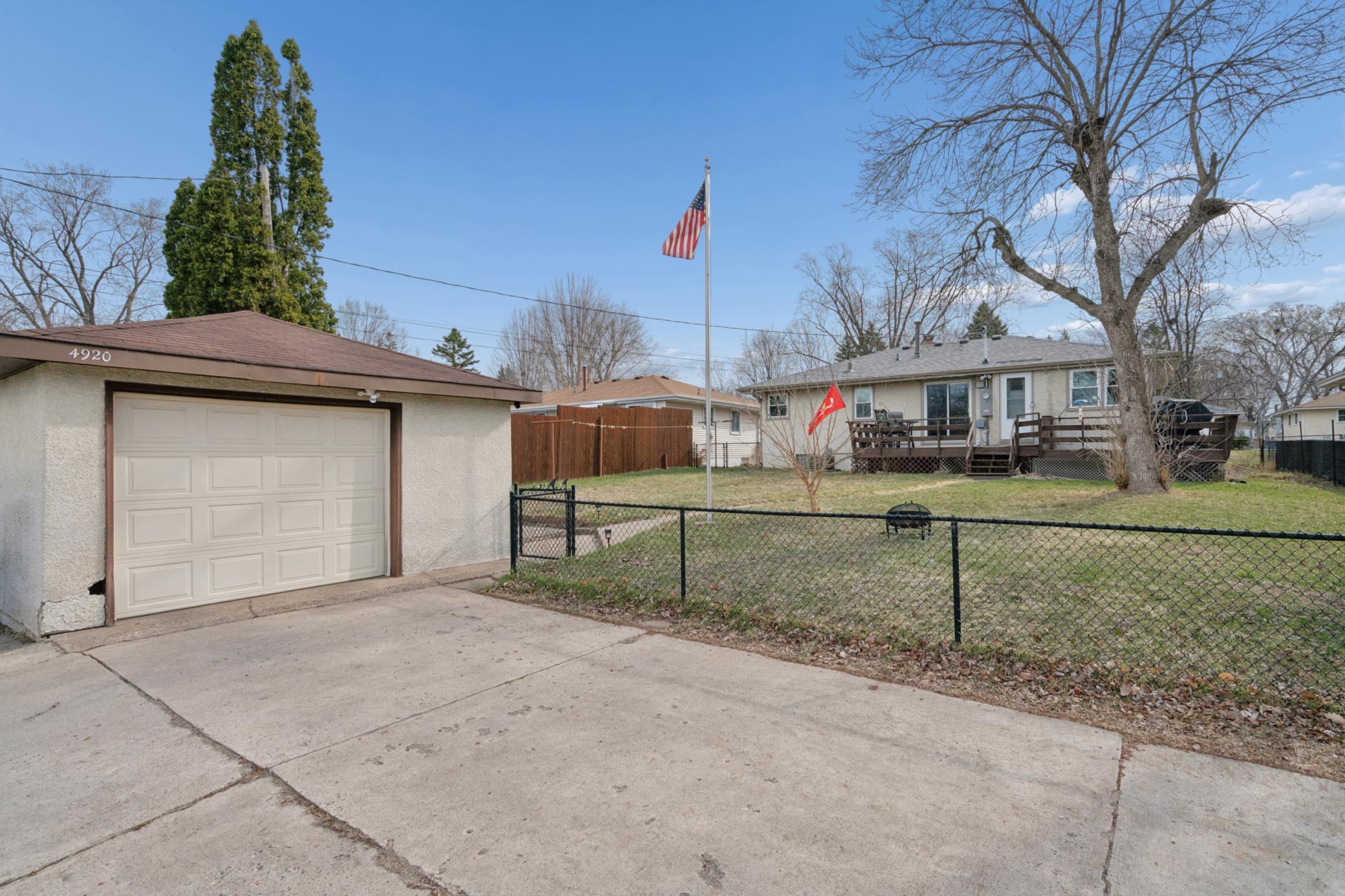 1 and a half car garage with a fully fenced backyard with room to enjoy, play, or garden