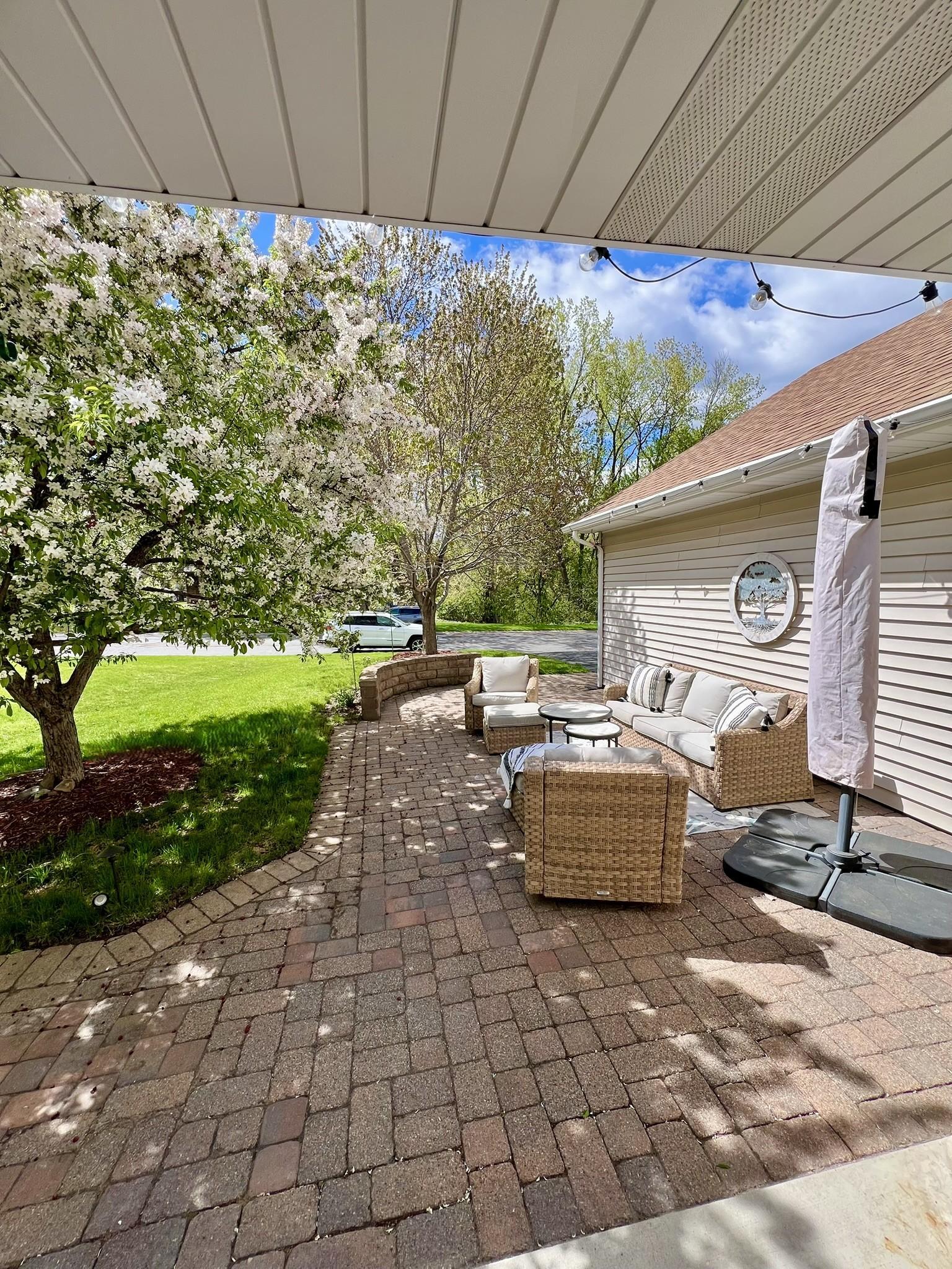View of the front paver patio from the covered front door.
