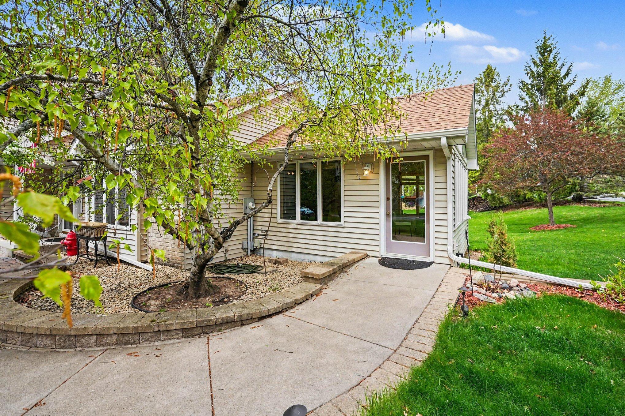 This view showcases the private, ADA-compliant entrance to the sunroom. Whether you envision a professional home office or a client-facing business, this separate entry offers endless possibilities for your lifestyle.