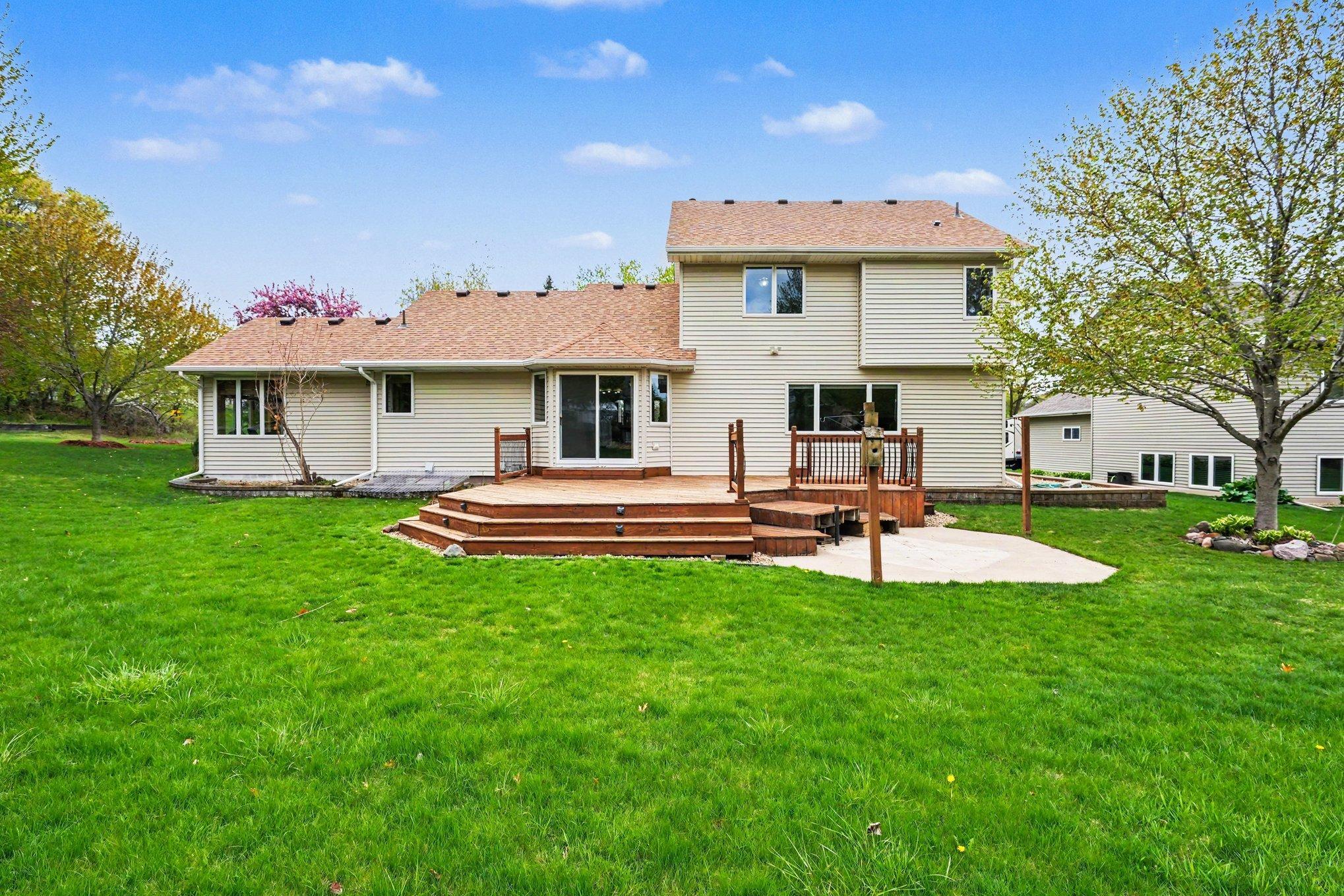 The spacious backyard is built for relaxation, featuring a massive $25' \times 21'$ deck and a $16' \times 11.5'$ concrete patio. With 220V service already in place, it’s perfectly prepped for your future hot tub!