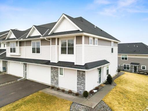Welcome home!! Wonderful end unit and lots of green space