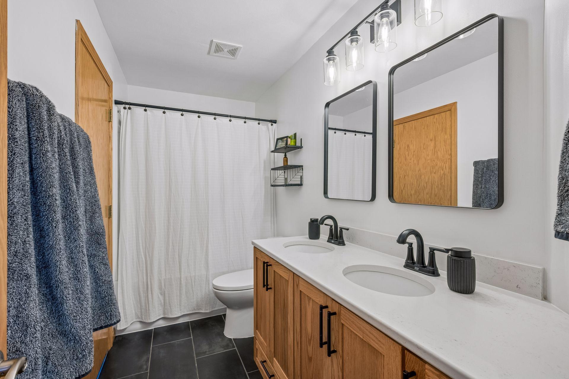 Updated Full Bathroom with double vanity sink