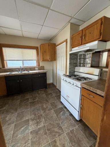 Functional kitchen with plenty of room for updates.