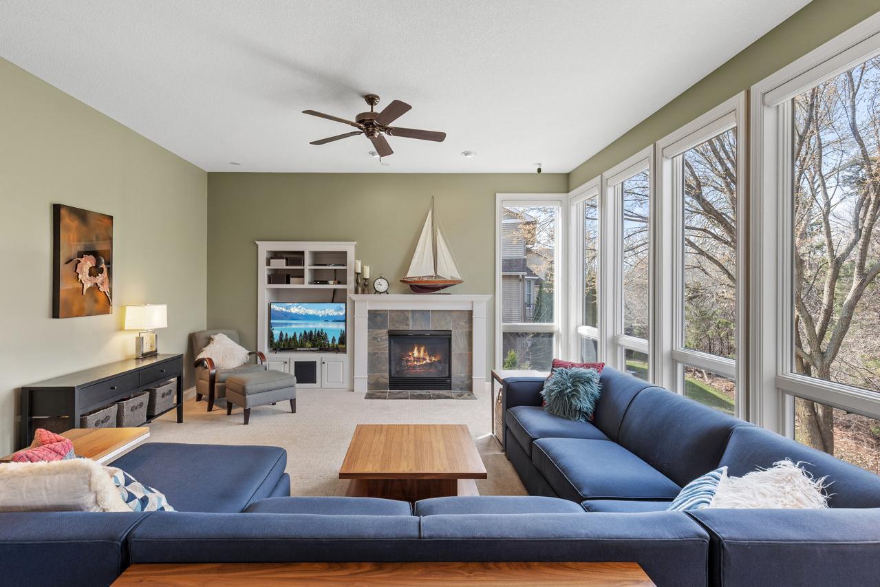 Cozy fireplaces centers the living space