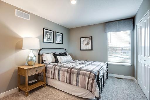 Each of the homes three additional bedrooms are also abundant in size! Picture of previously built model home, finishes, selections, and colors will vary.