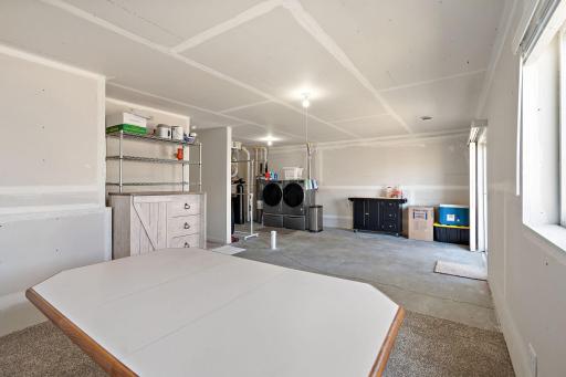 The basement is unfinished and ready for your imagination!