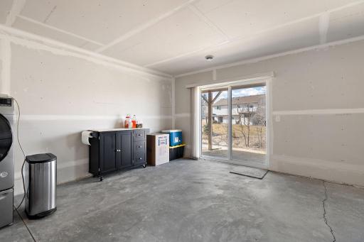 A patio door in the basement allows access to the backyard and lots of natural light.