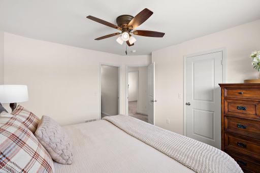 The primary bedroom has a walk-in closet and private bathroom.