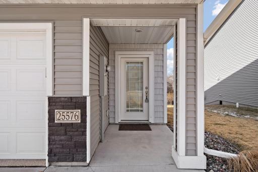 The main door is shaded and protected from the elements.