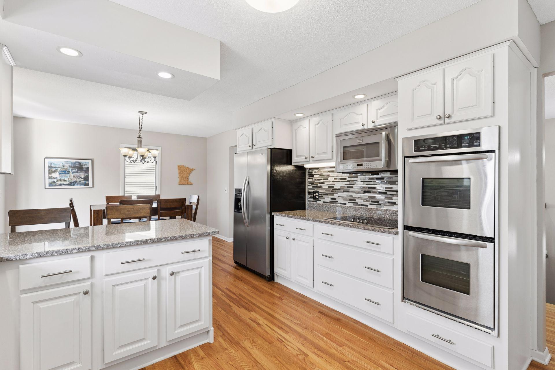 Double wall oven and electric cooktop.