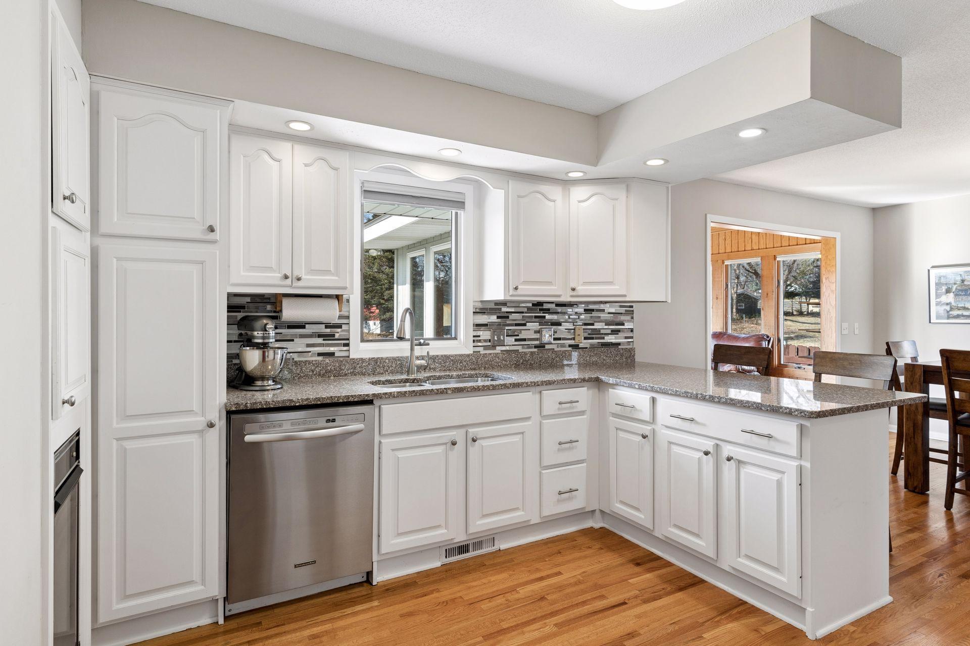 Note: stainless steel dishwasher has been replaced with a brand new white dishwasher.