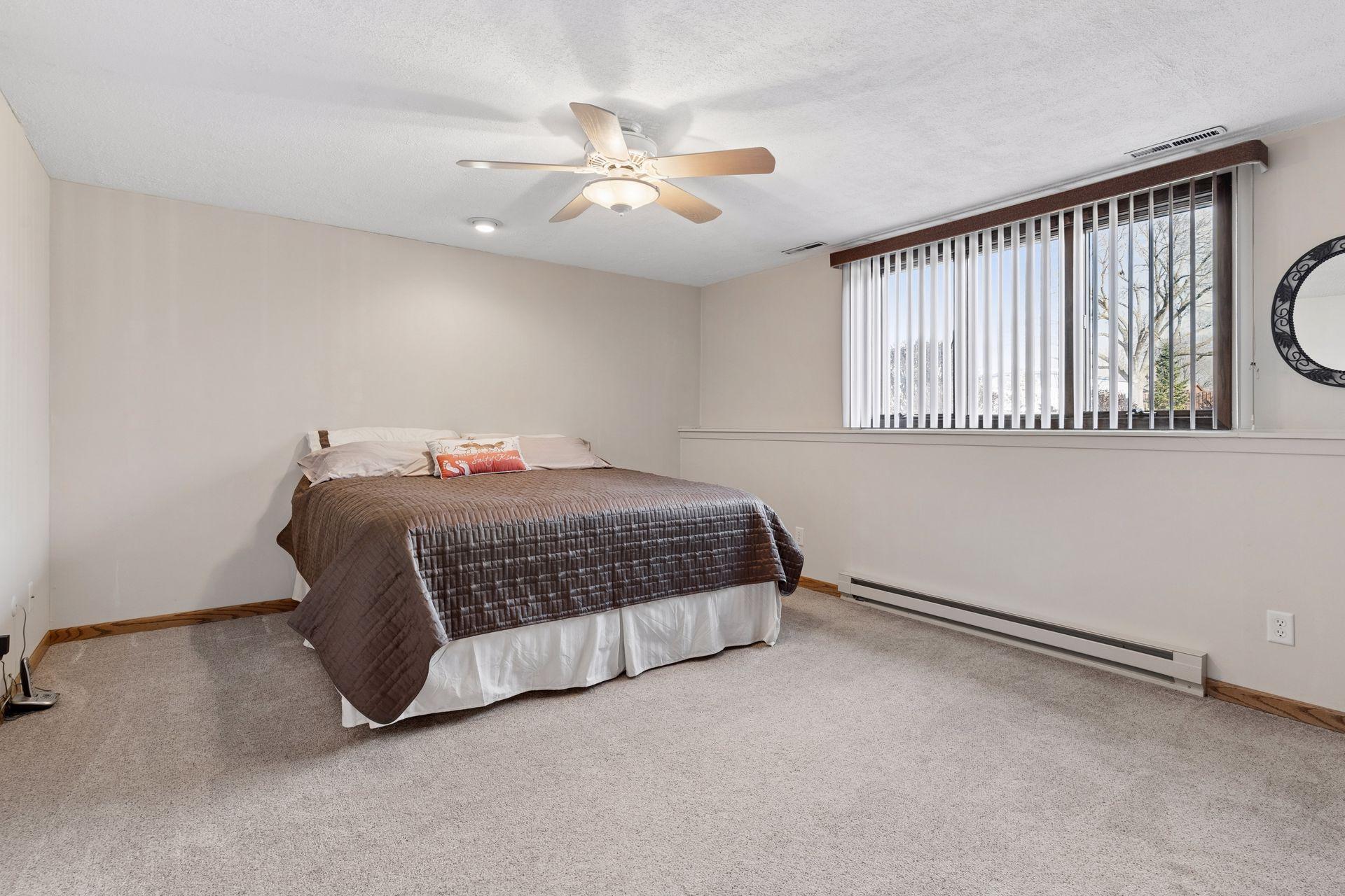 Lower level bedroom or versatile rec room.