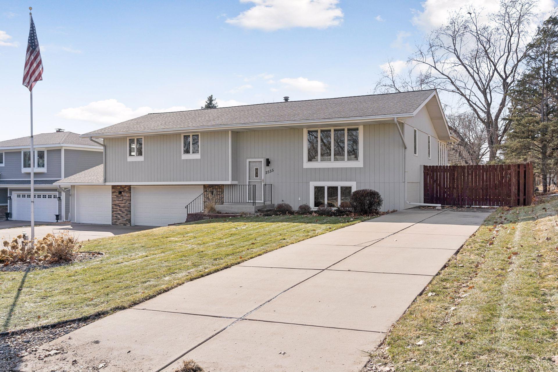 BONUS second concrete driveway for RV/boat parking. Gate opens to a backyard parking pad.