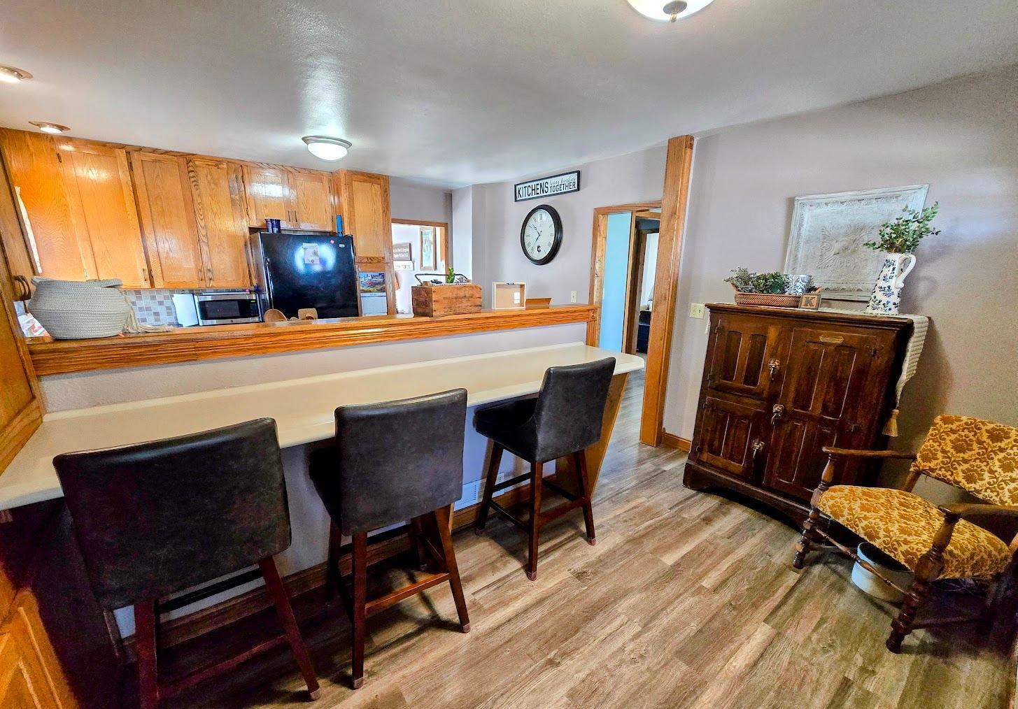 Eat in kitchen area with dining bar.
