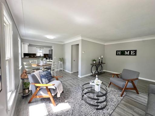 Open concept living room, dining and kitchen