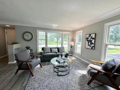 Enjoy spacious Living Room and tons of natural light coming through the windows around.