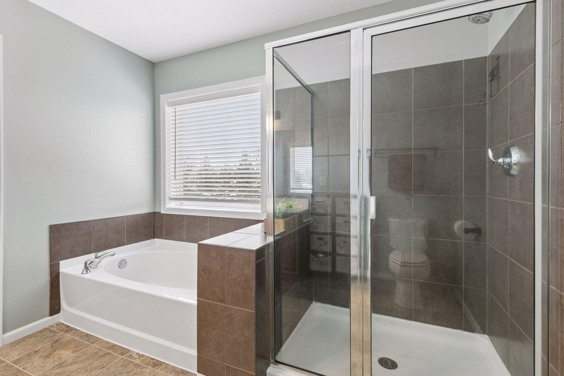 Separate Shower and Garden Tub in the primary bathroom