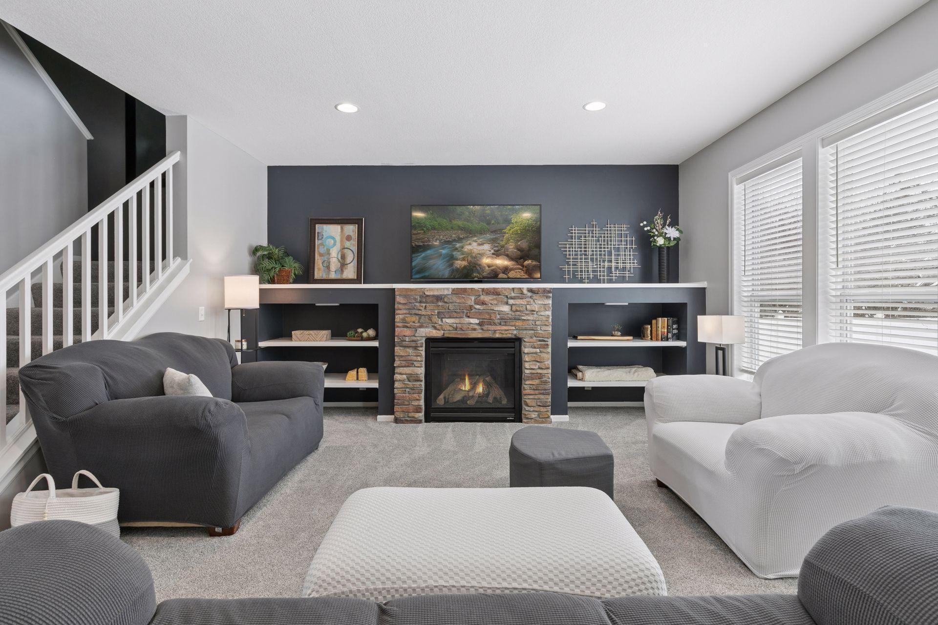 Main Floor living room with built in entertainment areas