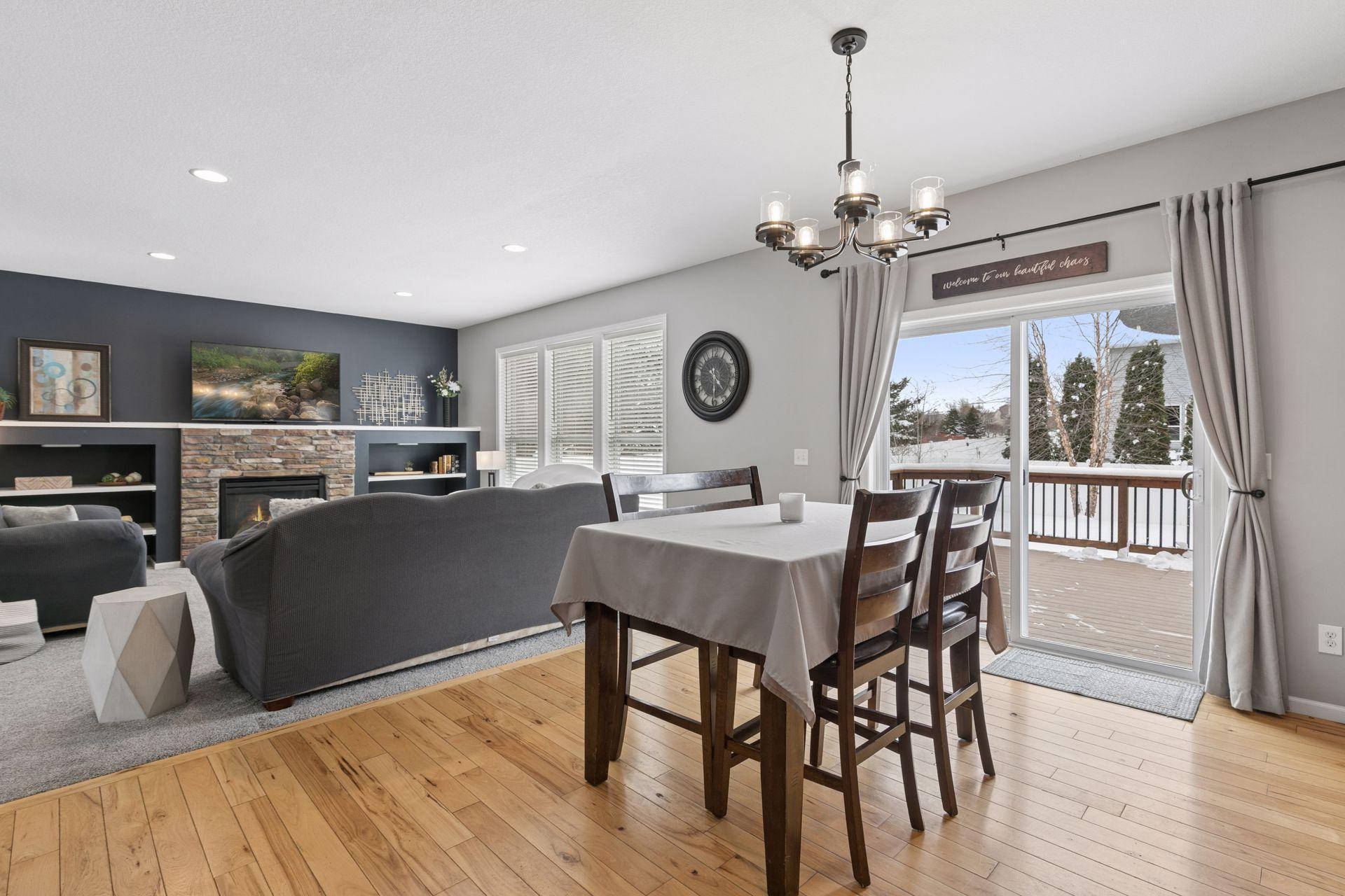 dining area opens up to the composite deck area and the stamped patio space