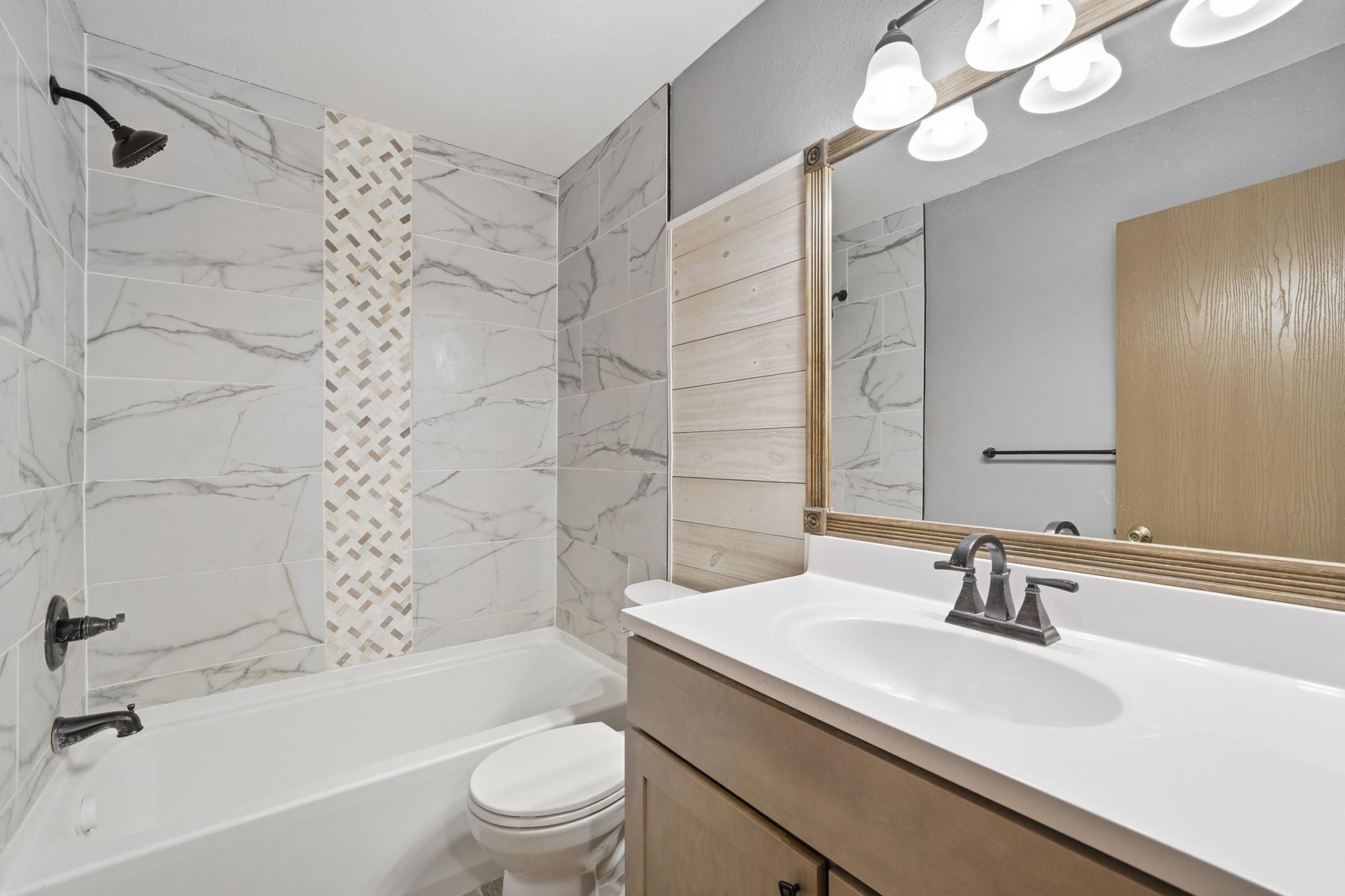 Bathroom tiled bath and shower