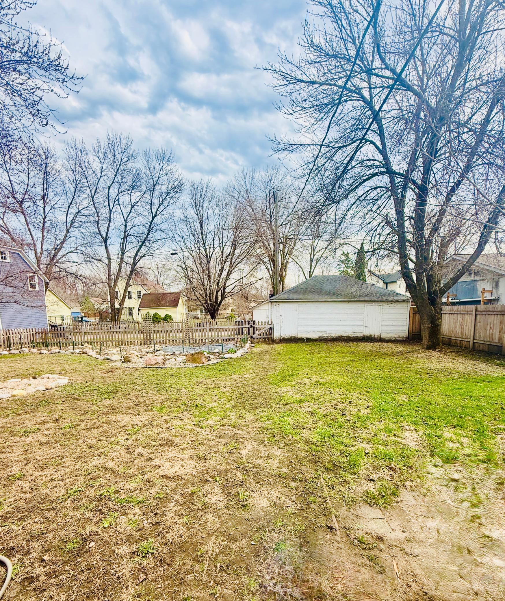 Extra large lot to create your dream garden or entertaining space!