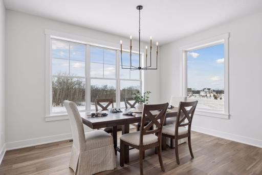 Informal dining room leads to the 4-season porch