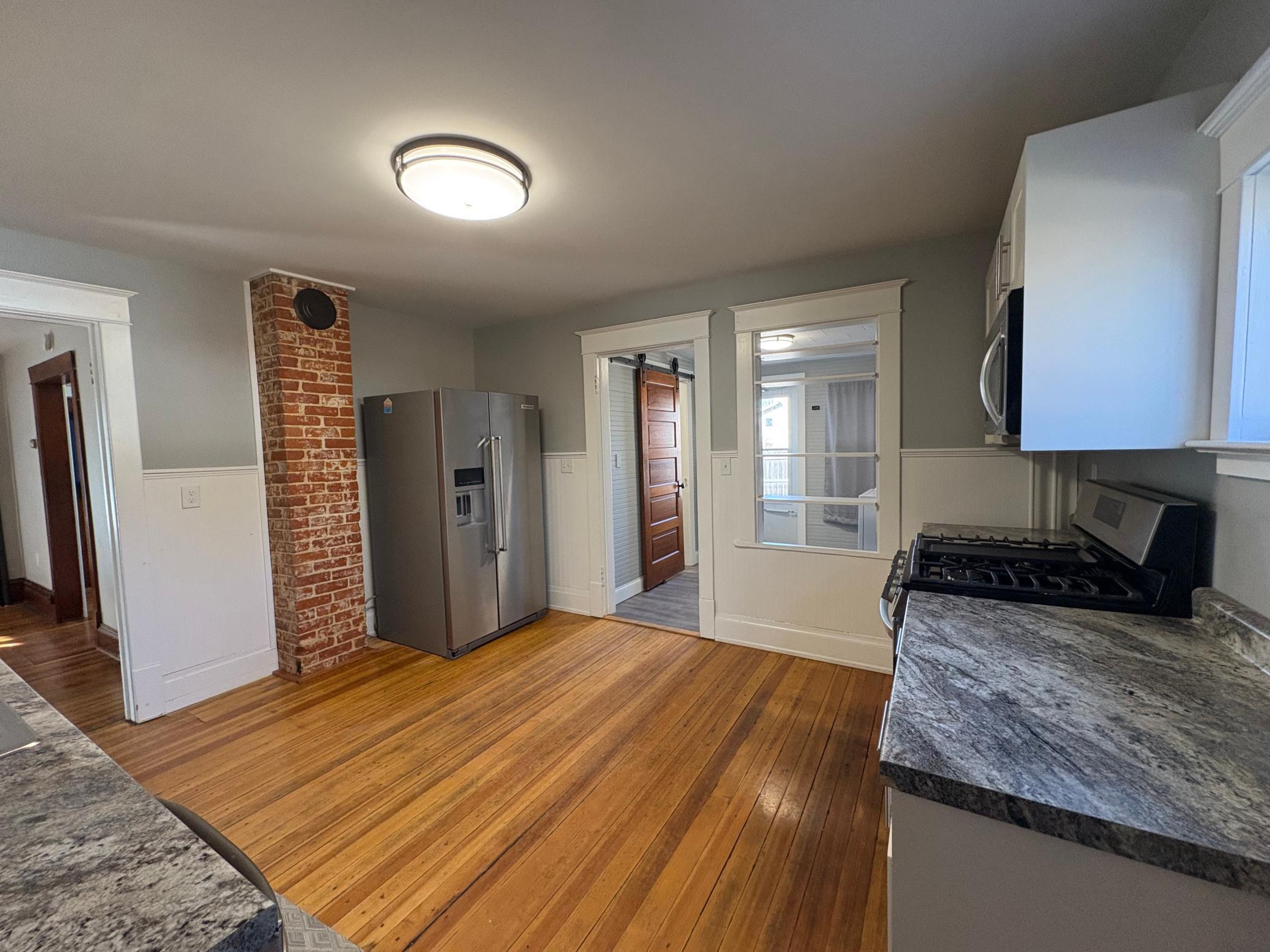 kitchen into laundry room and bathroom
