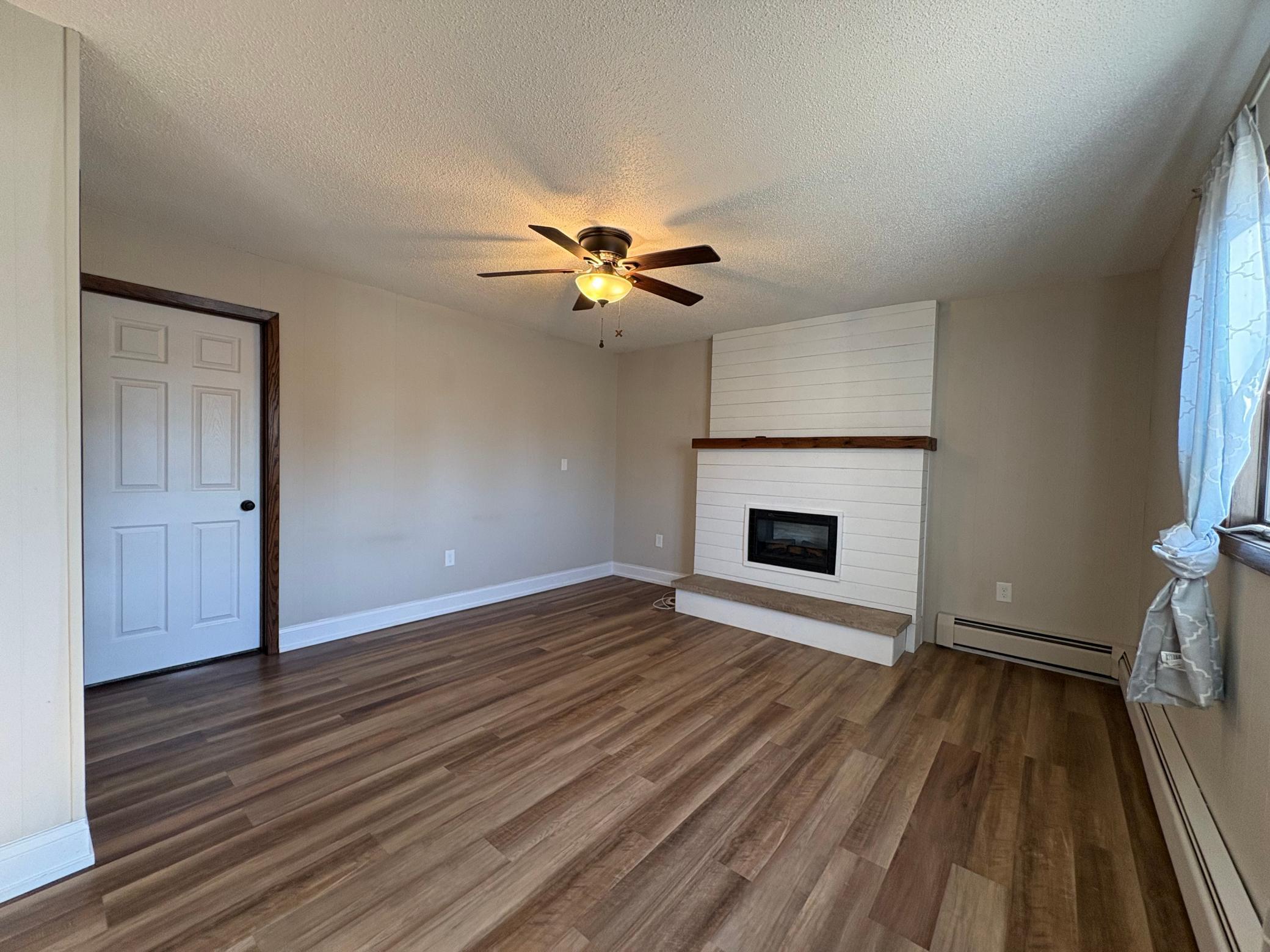 family room with gas fireplace.jpeg