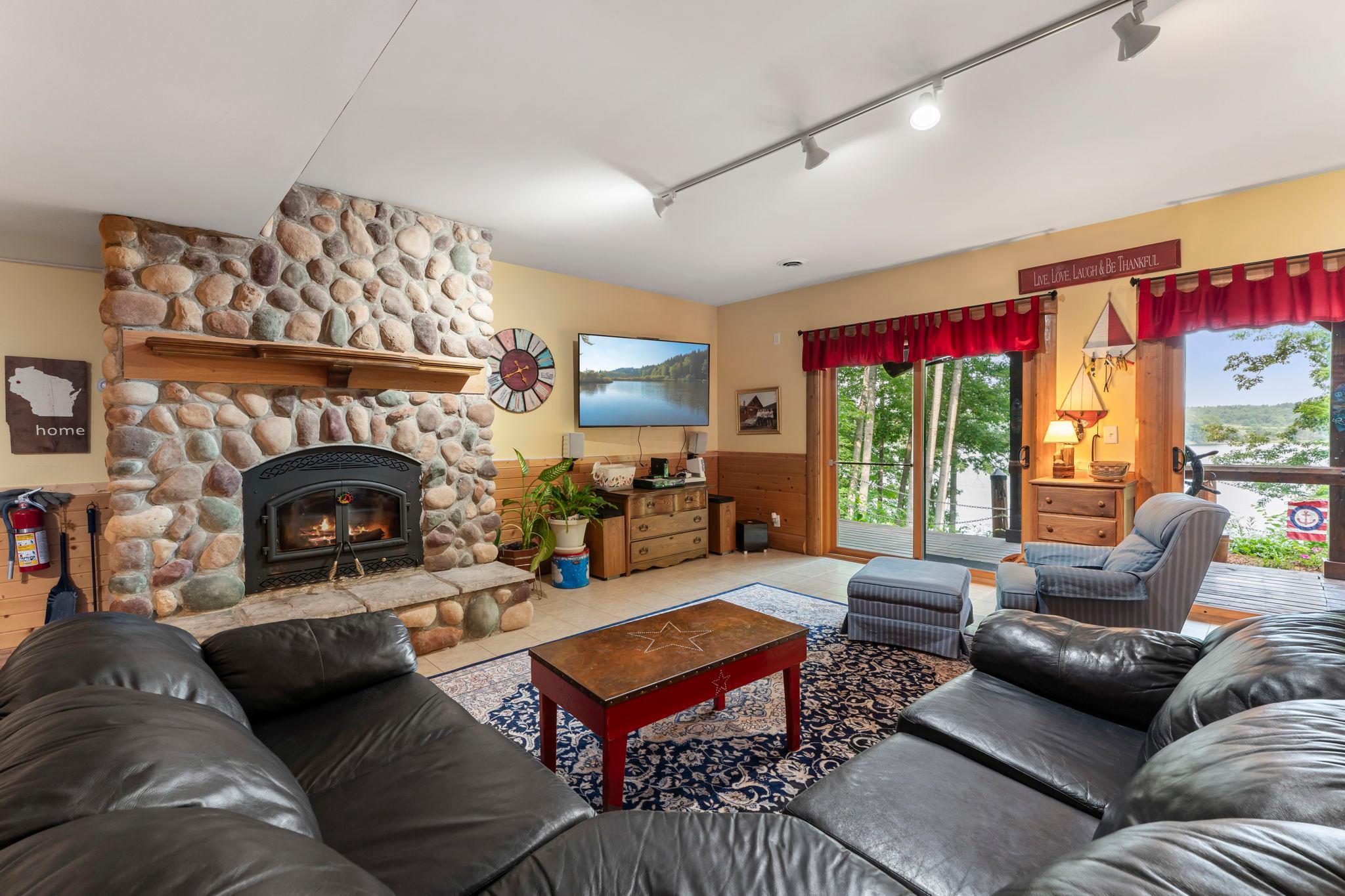 Family room that walkouts out to patio grilling, firepit area