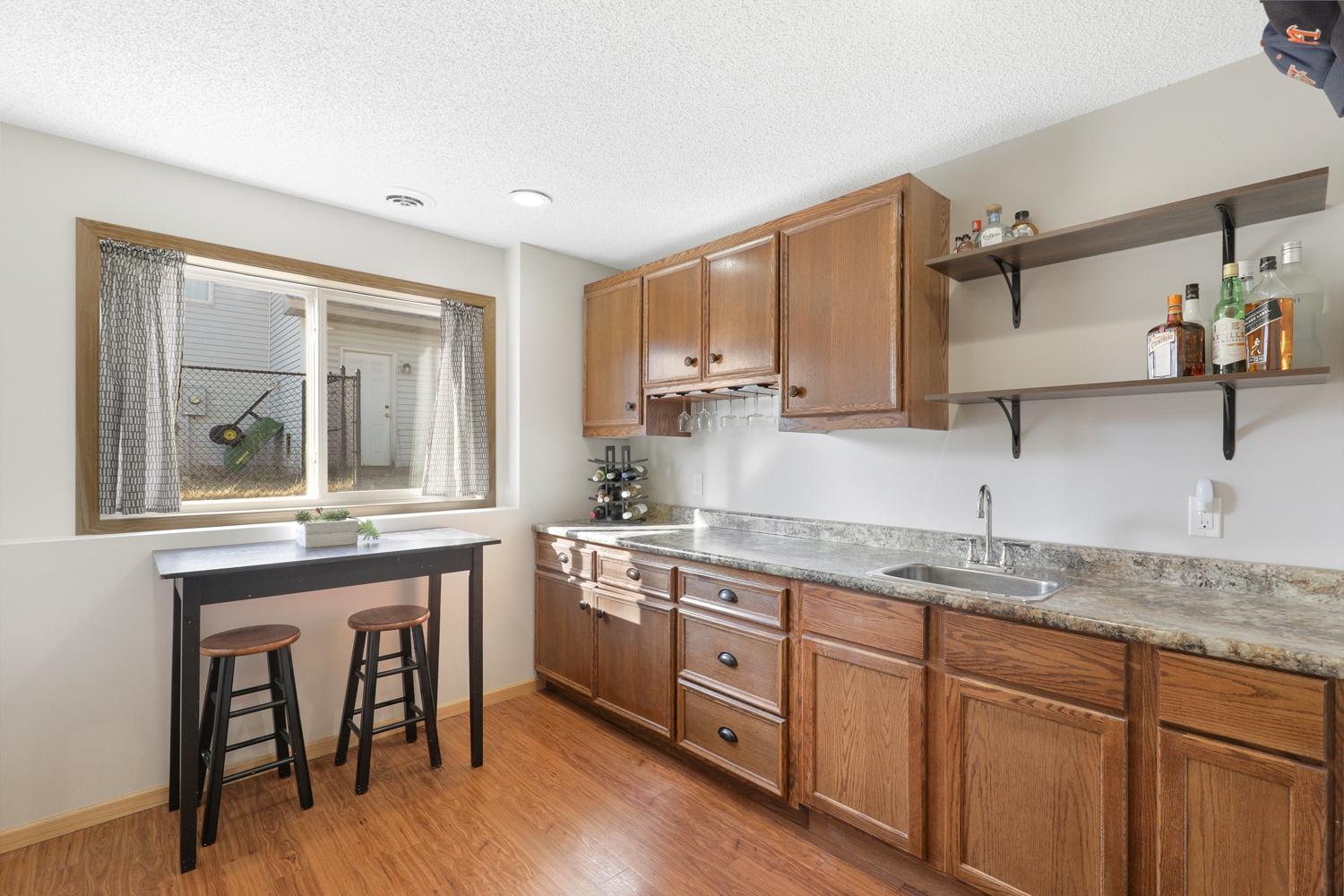 Bonus wet bar room in lower level provides a moment for gathering and connection!