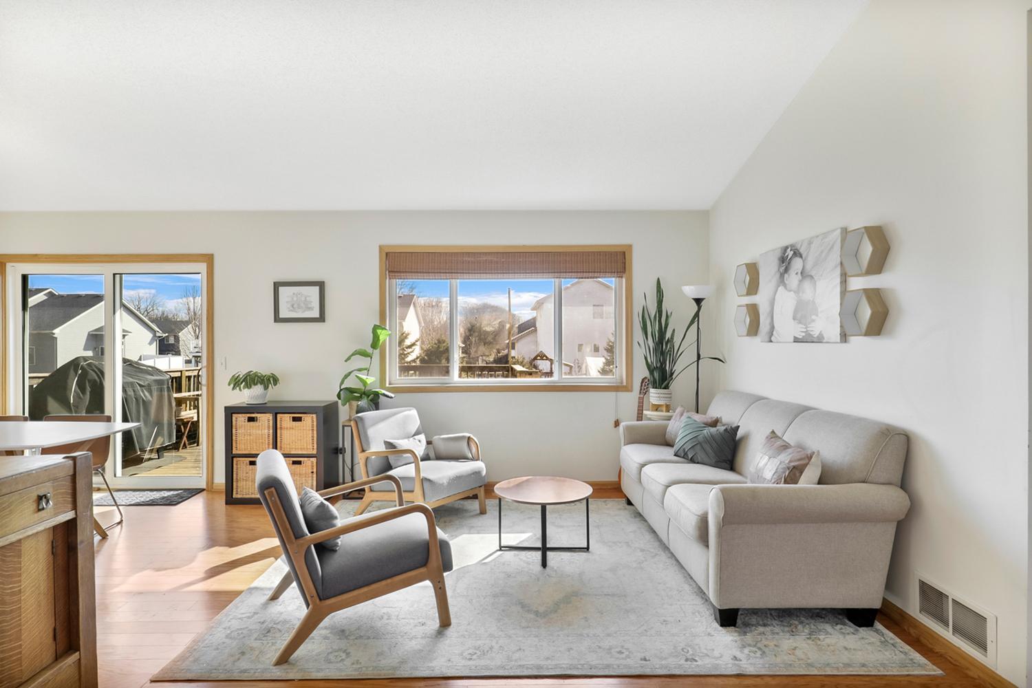 Open concept living, vaulted ceilings and hardwood floors.