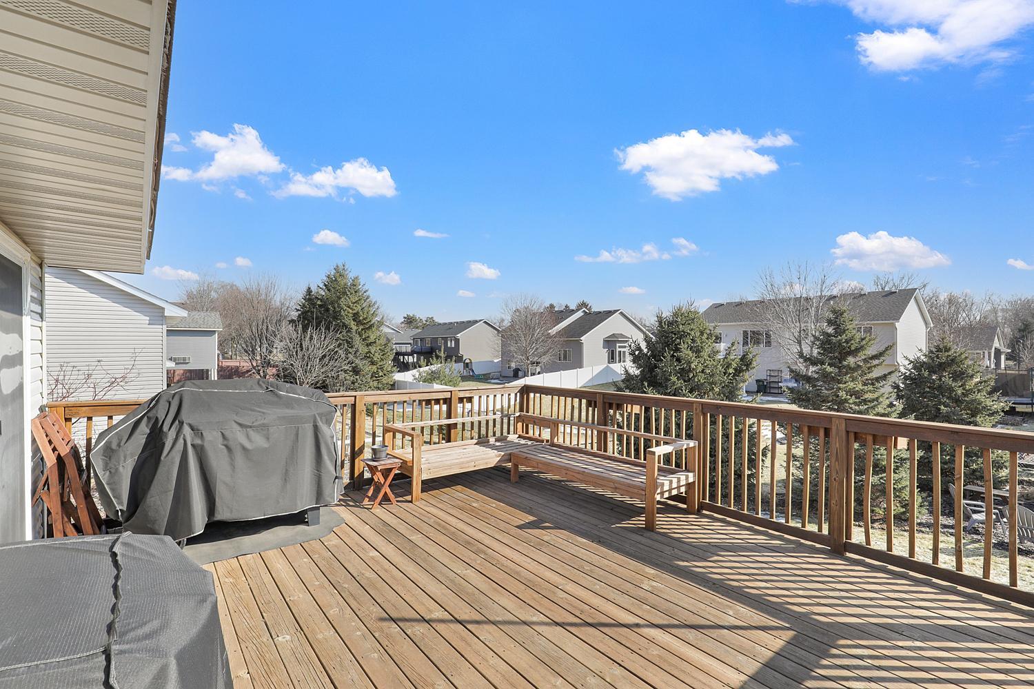 Large deck off the main level dining and living.