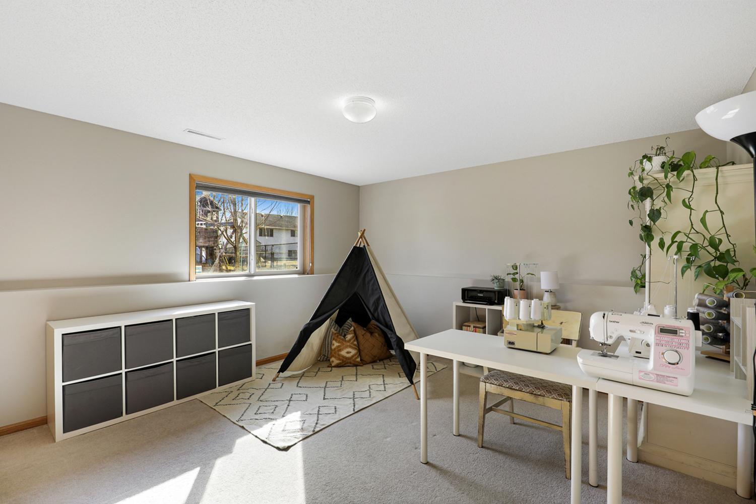 Large fourth bedroom in the lower level has enough space for multi purpose, or a guest bed away from the hustle and bustle. 3/4 bath down as well!