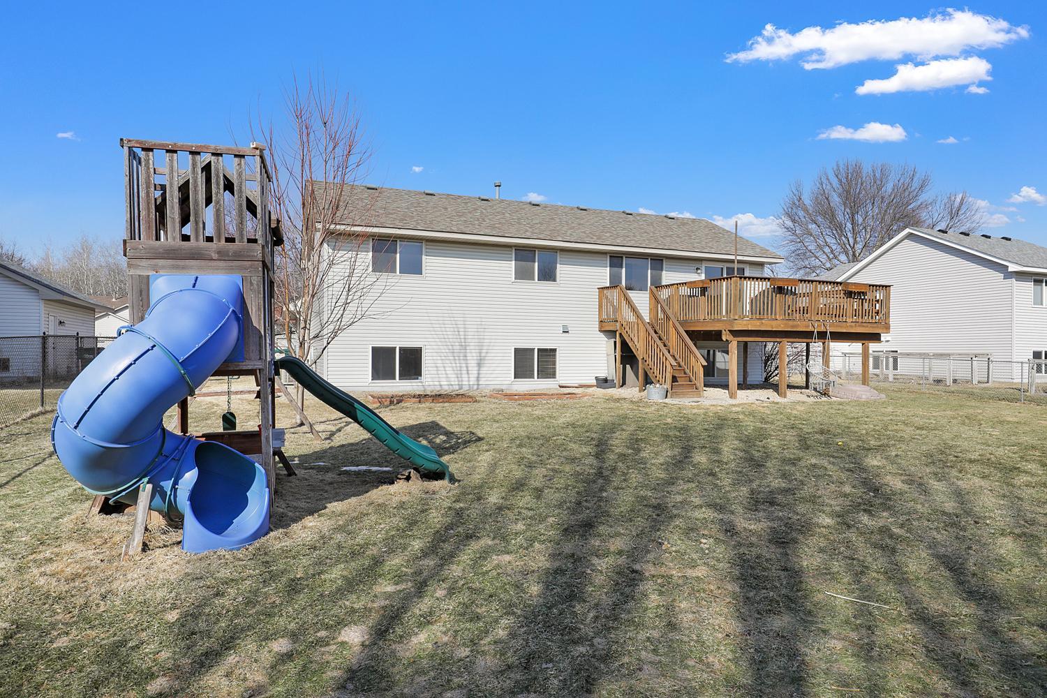 A south facing back yard is the perfect oasis to enjoy sitting on your deck or playing!