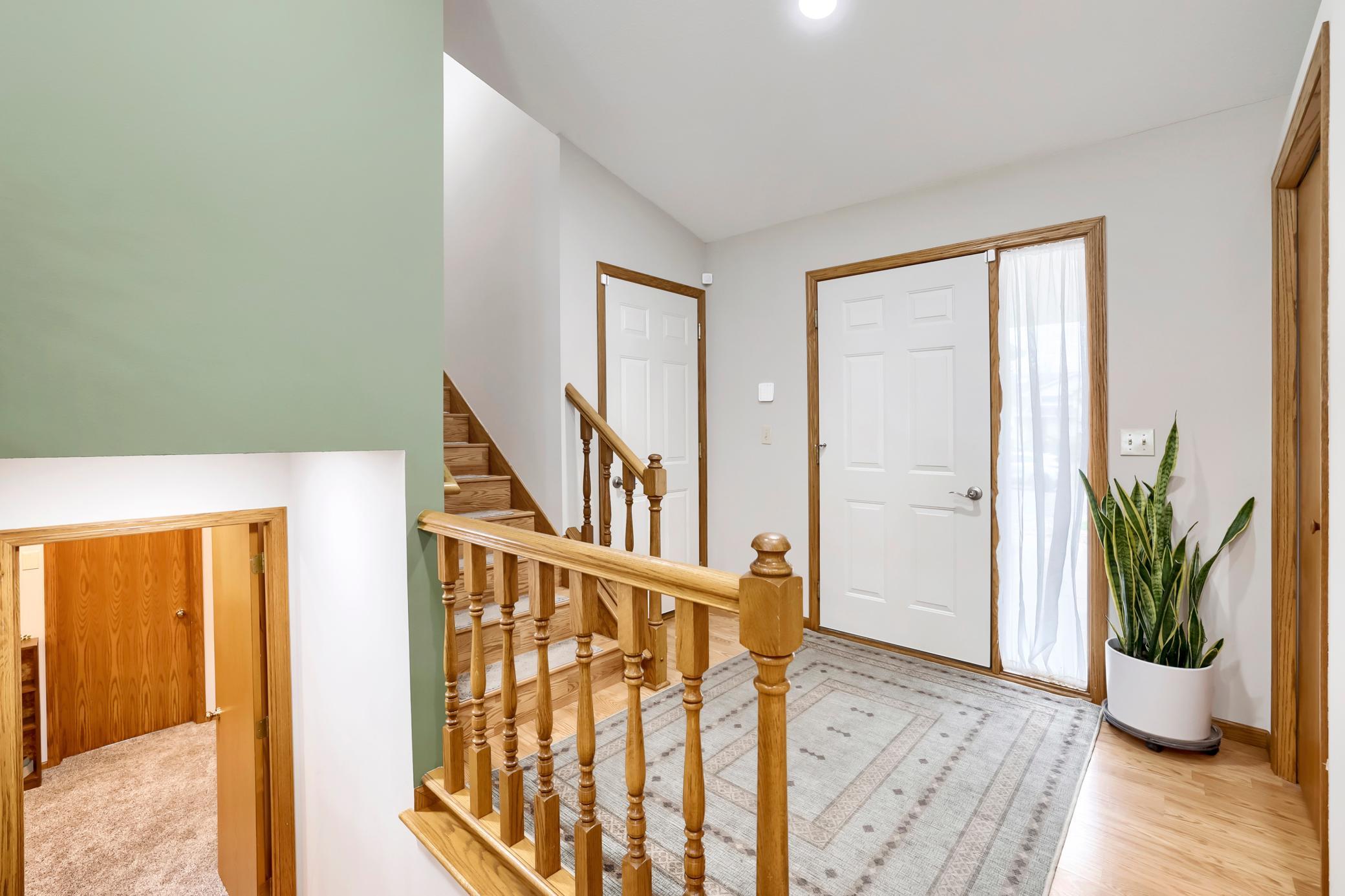 Enjoy the roomy entryway with a good sized closet and easy access to the garage