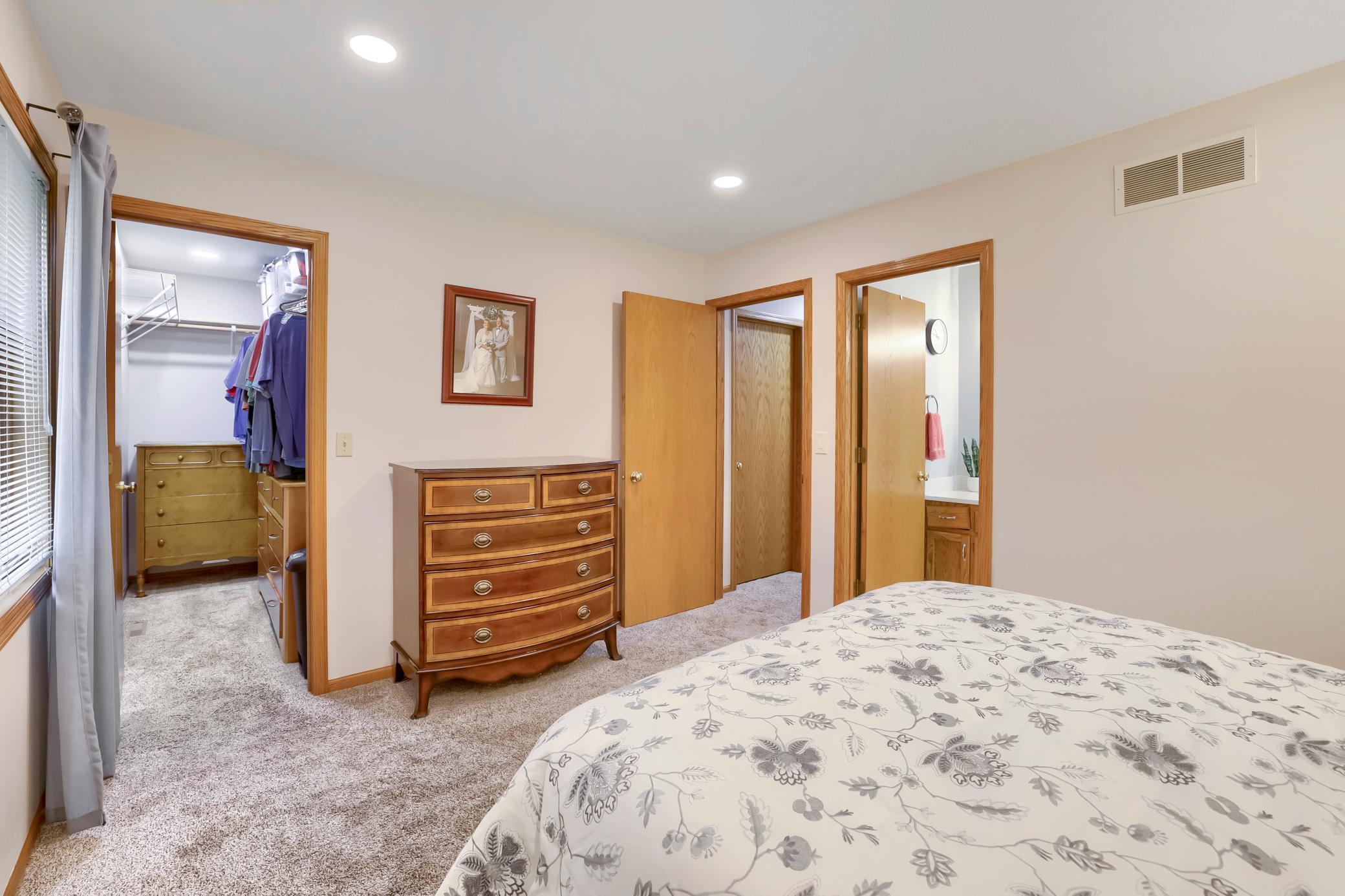 The deep walk in closet offer plenty of space