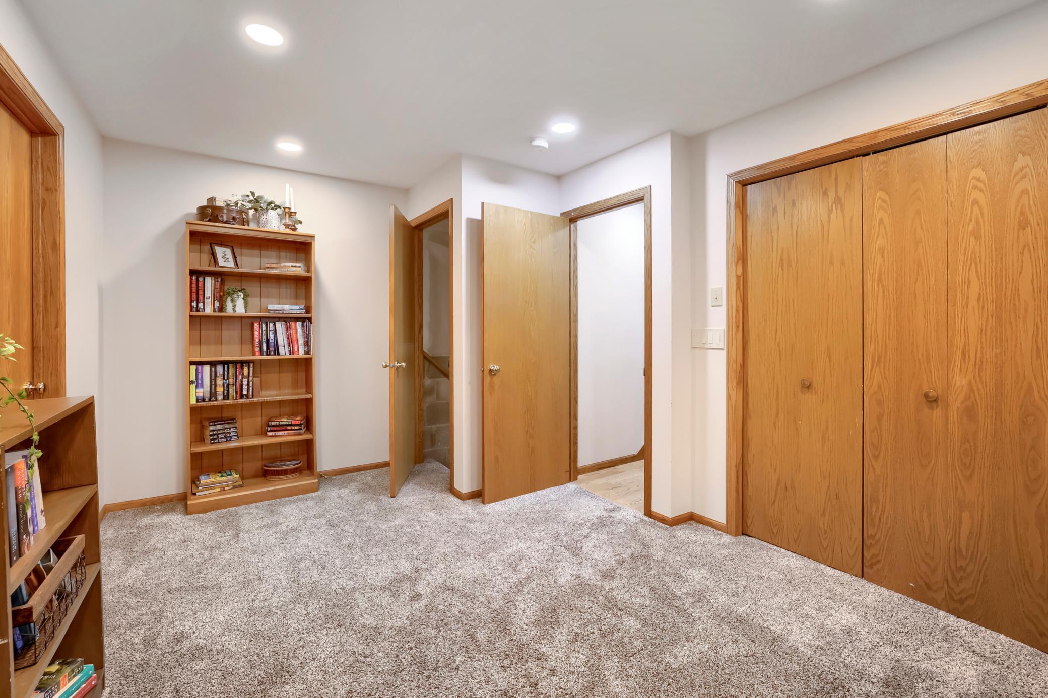 The door to the main floor provides a beneficial sound barrier from the rest of the house as does the door to the basement stairway plus there is a large storage closet too!