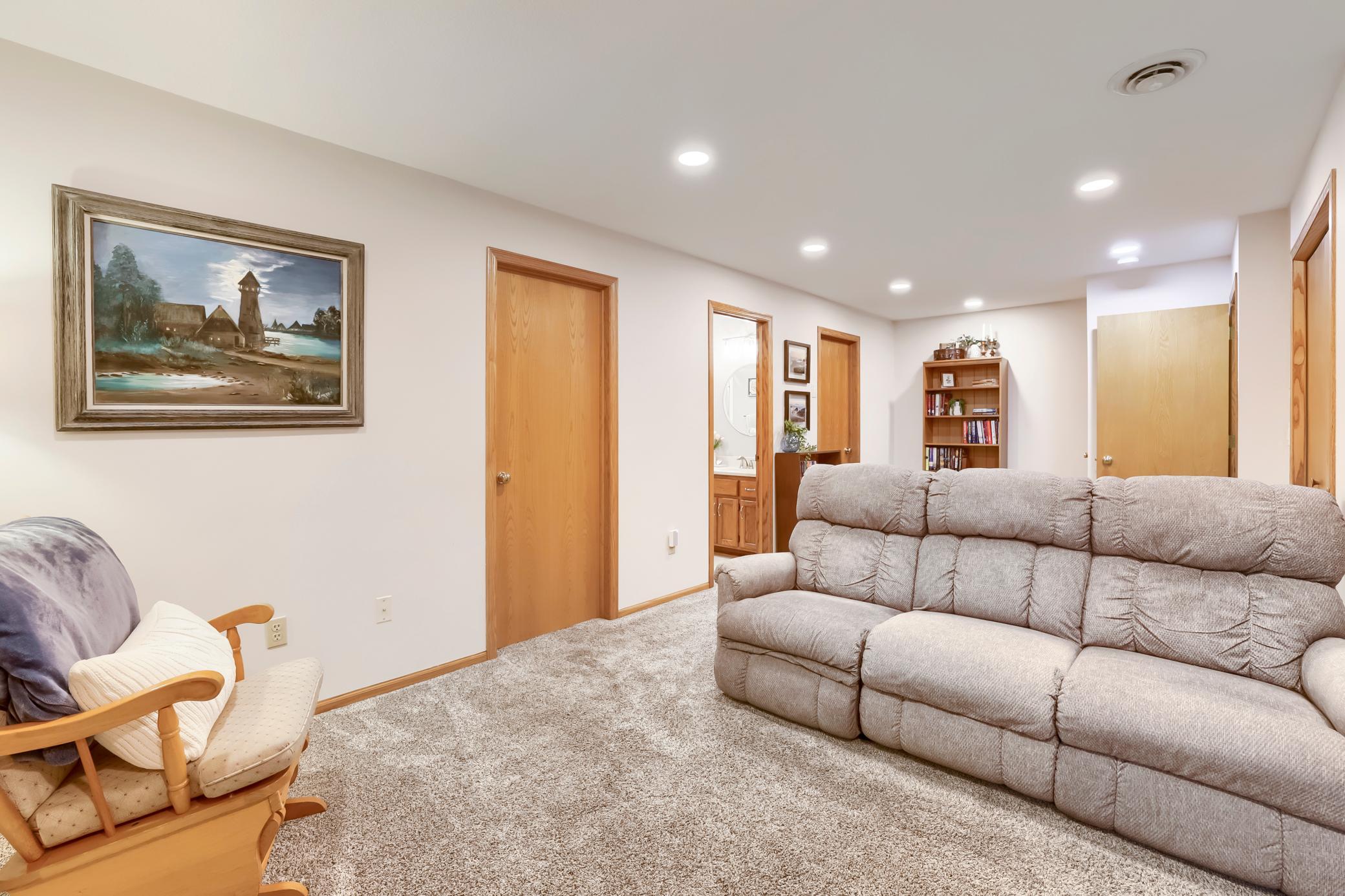 The lower level bedroom, bath and laundry room are conveniently located off of the family room