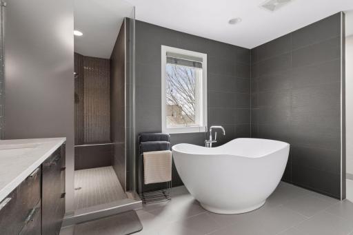 This is Kohler's Abrazo soaking tub, 524 pounds of matte KOHLER lithocast.