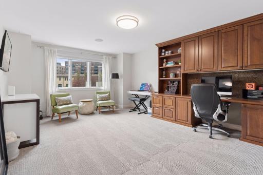 This fourth bedroom is currently being used as office, light work-out, flex space. Two large closets(one of which abuts the powder room) invite easy conversion to another bedroom suite.