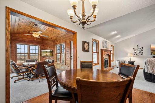Views from the dining room table allow you to see the backyard and fireplace.