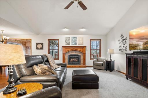 The gas fireplace and views of the backyard make the living room warm and inviting.