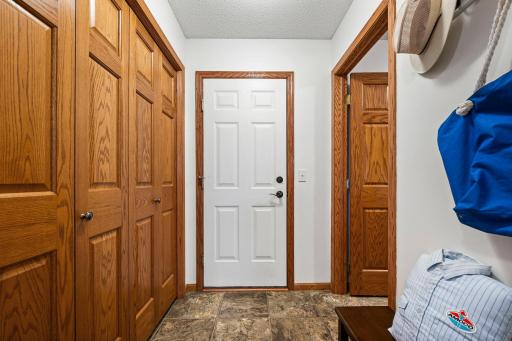 Lots of closet space near the garage entrance keeps clutter away from the living areas.