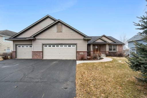 This 4-bedroom, 3-bathroom rambler has nice curb appeal.