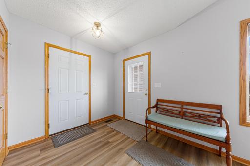 Spacious foyer with room to sit to remove shoes