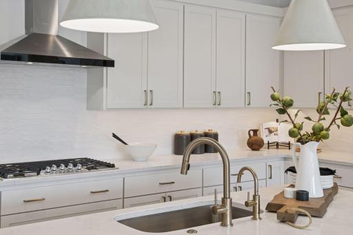 Photos are of the model home located at 5655 Buffington Lane. Design selections and upgrade options may vary.
