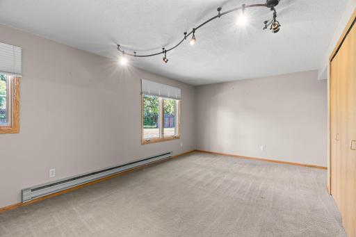Fourth bedroom on the lower level adds flexible space for family, guests or home gym