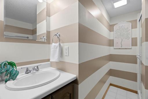 Third bathroom on the lower level with a shower