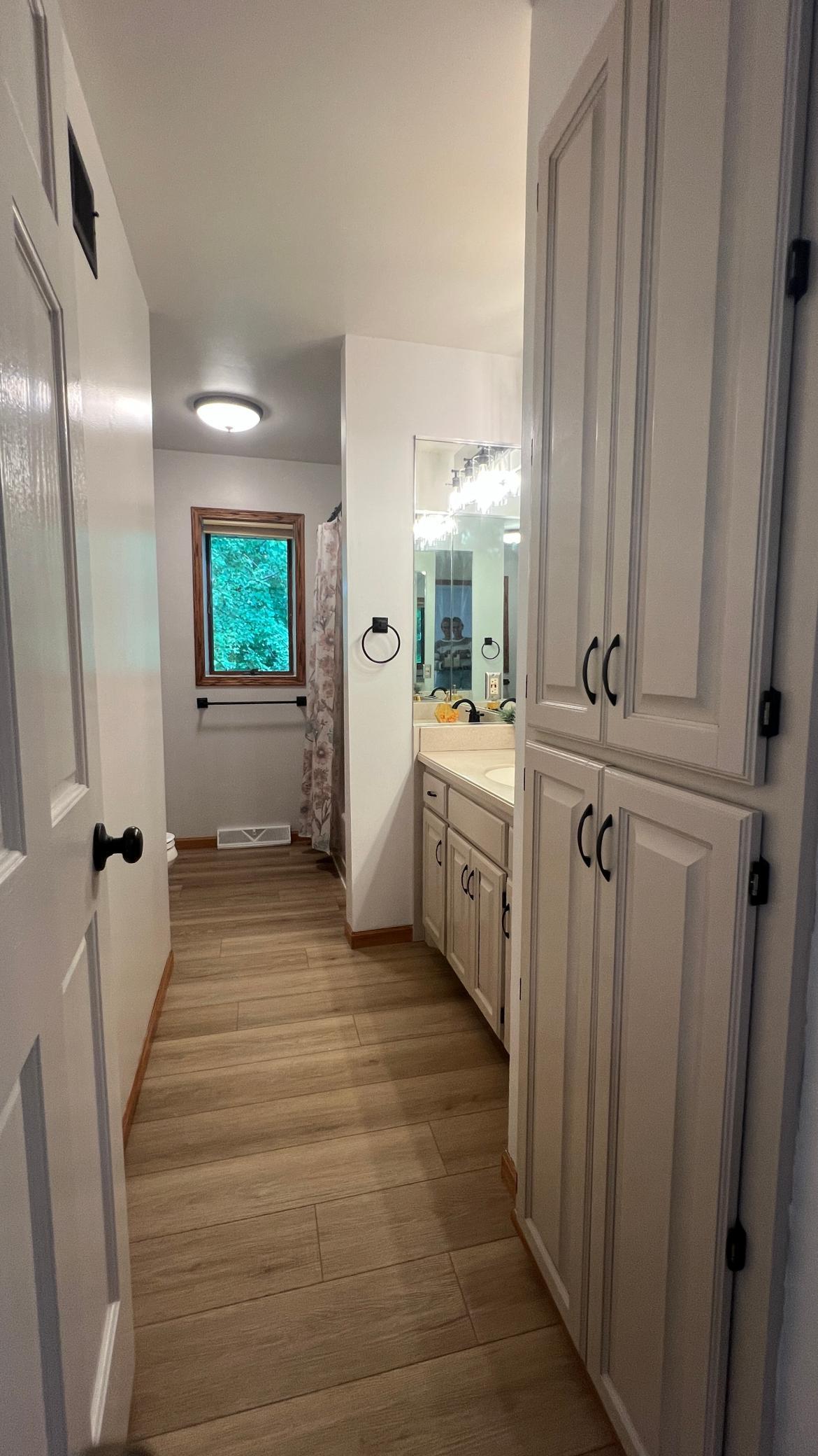 Primary walk-thru Bathroom